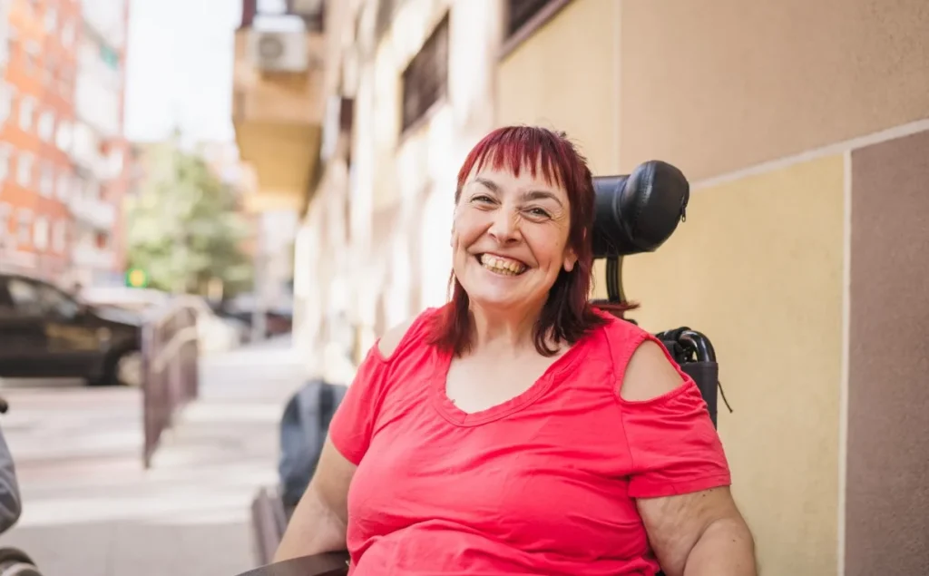 Disabled woman smiling at camera