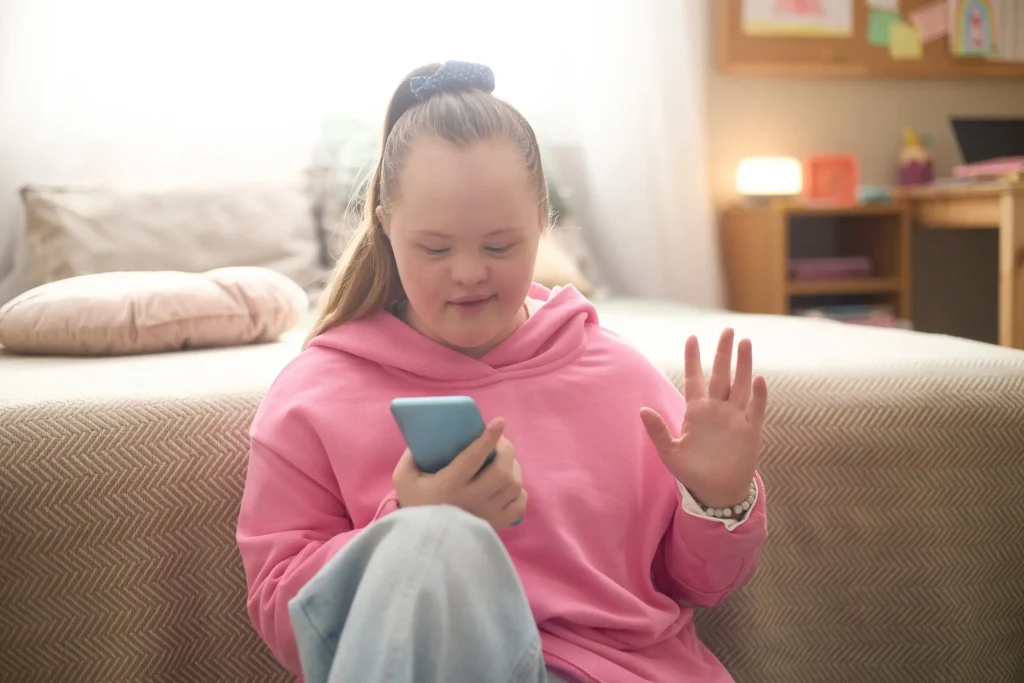 Disabled woman using mobile phone