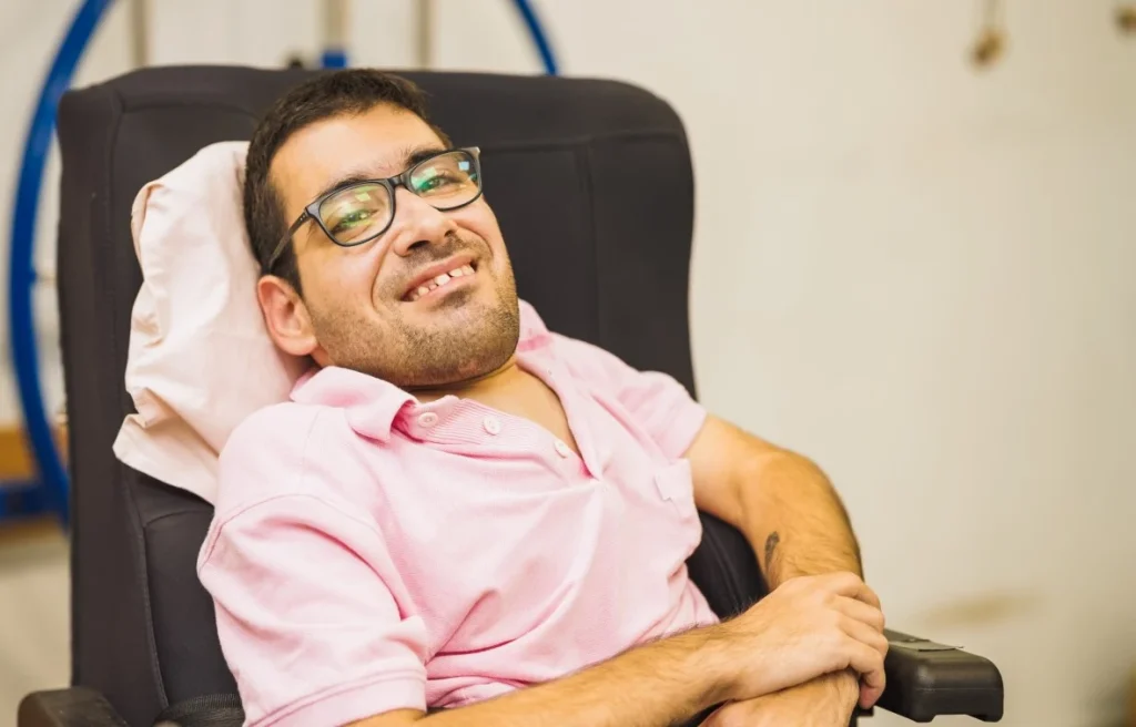Disabled man smiling at camera